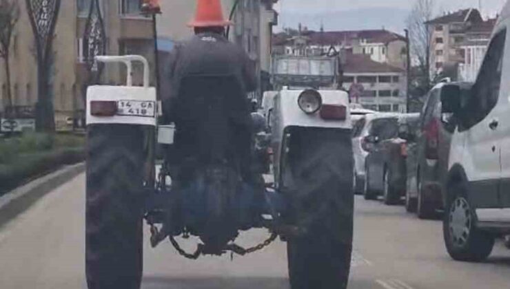 Bolu’da başına duba geçiren traktör sürücüsü, caddede ilginç görüntülere neden oldu